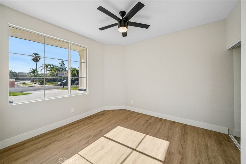 12842 Tilden Drive Rancho Cucamonga, CA 91739 - Photo 55 of 71 a view of a big room with wooden floor and a window