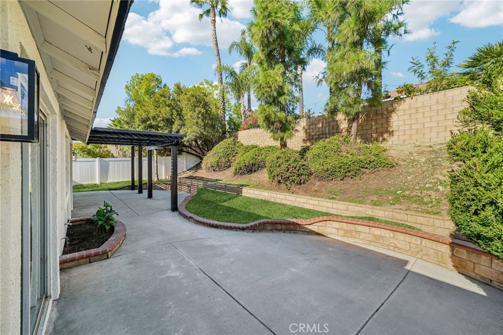 12842 Tilden Drive Rancho Cucamonga, CA 91739 - Photo 64 of 71 a view of backyard with plants and outdoor seating