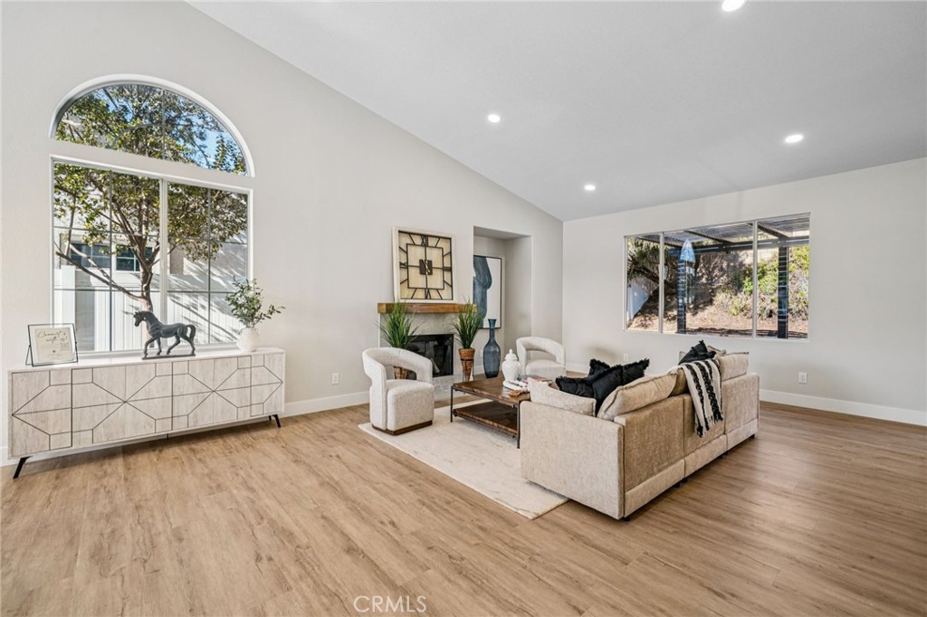 12842 Tilden Drive Rancho Cucamonga, CA 91739 - Photo 9 of 71 a living room with furniture and a large window