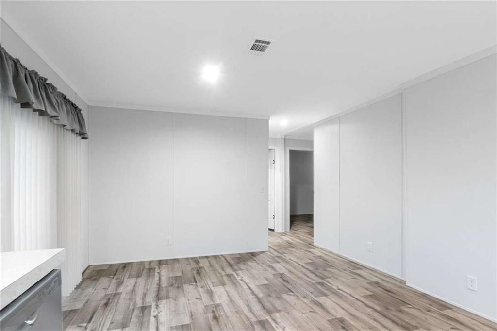 277 Napier Road Southwest Eatonton, GA 31024 - Photo 15 of 34 a view of room with walk in closet and window