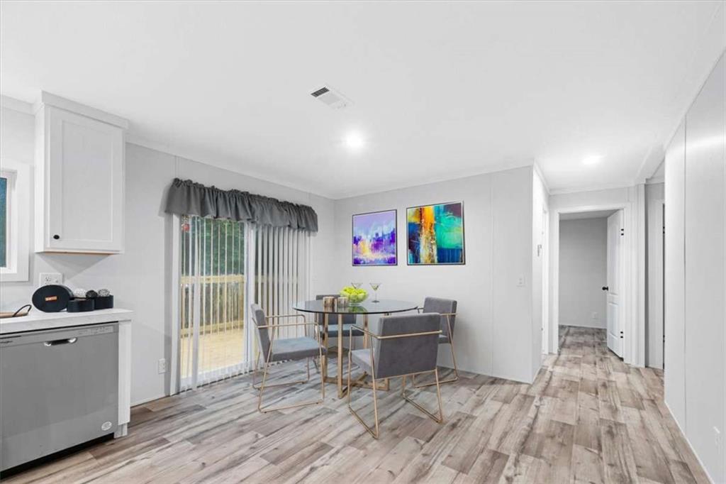 277 Napier Road Southwest Eatonton, GA 31024 - Photo 4 of 34 a view of kitchen and wooden floor