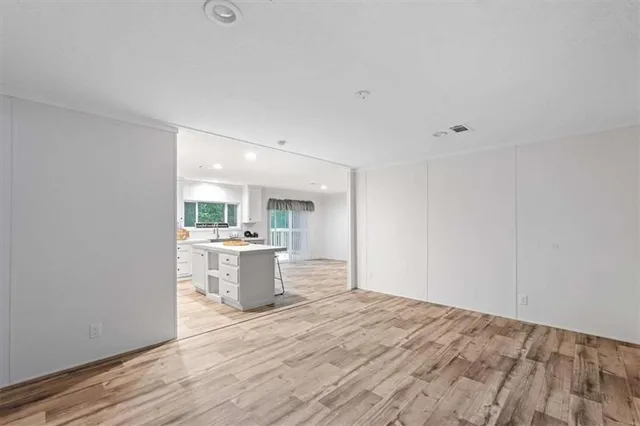 a view of a kitchen and a window