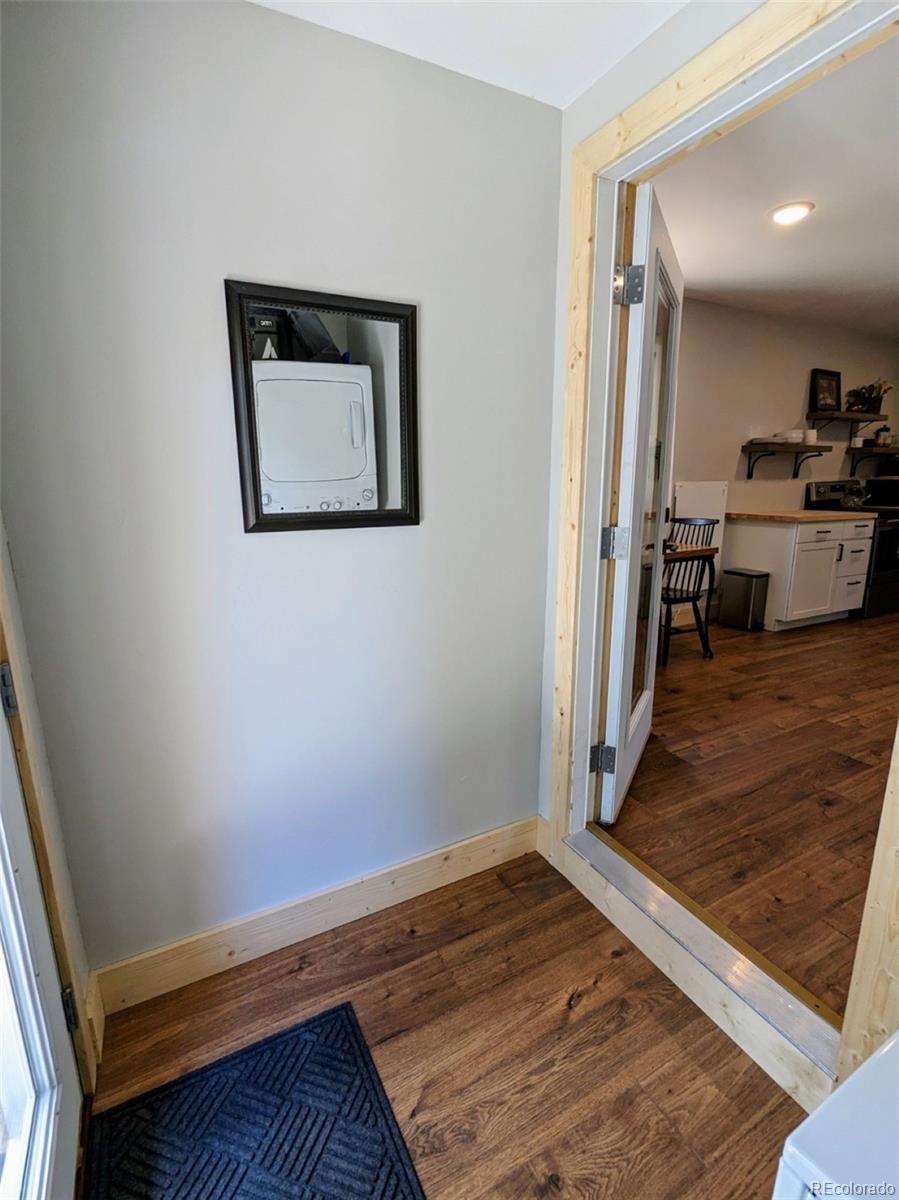 200 County Road 4C-E Leadville, CO 80461 - Photo 12 of 36 a view of a hallway with wooden floor and furniture