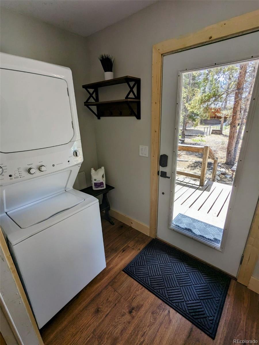 200 County Road 4C-E Leadville, CO 80461 - Photo 14 of 36 a bedroom with a bed and wooden floor