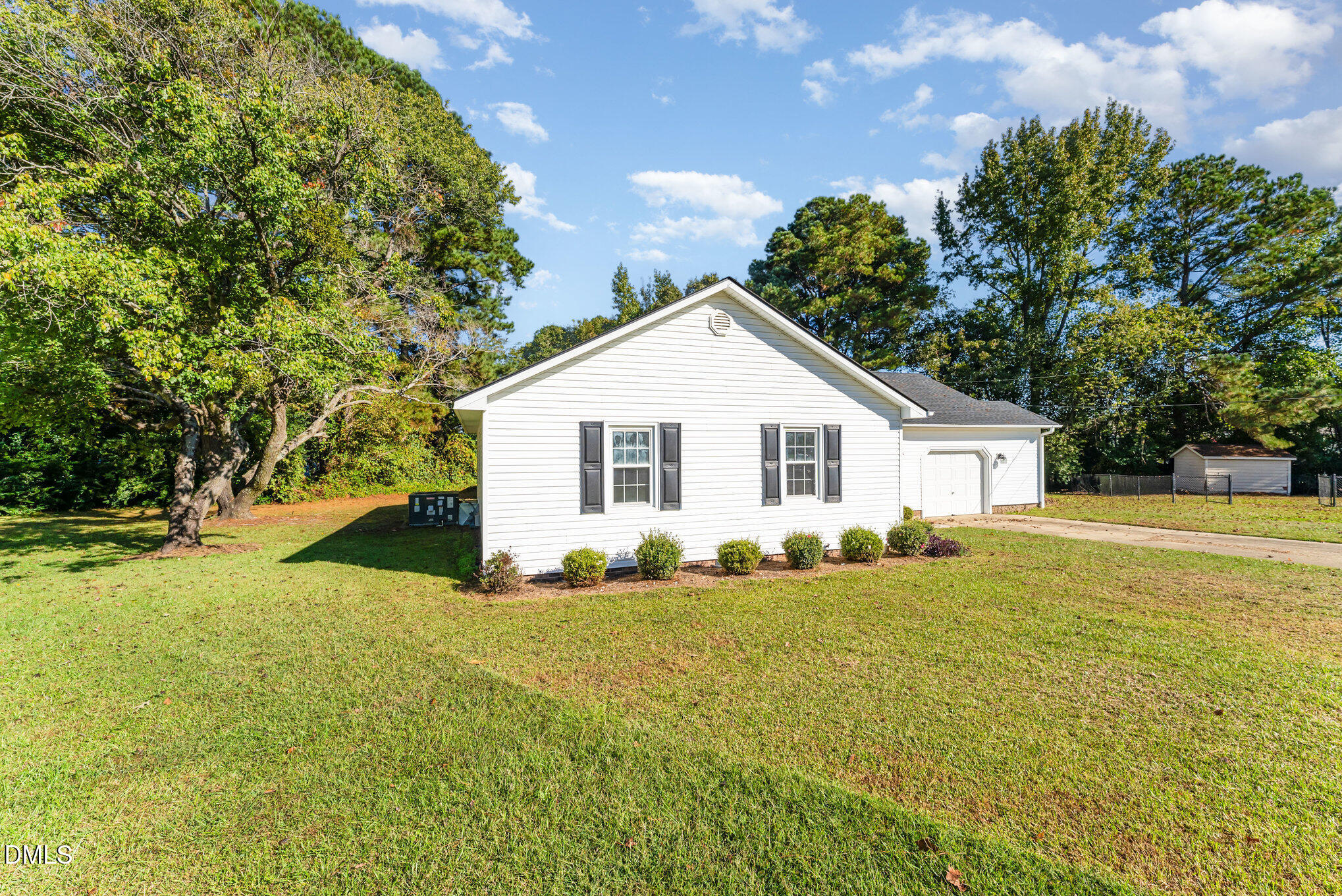 110 Rose Circle Dunn, NC 28334 - Photo 2 of 37 a view of a house with a yard