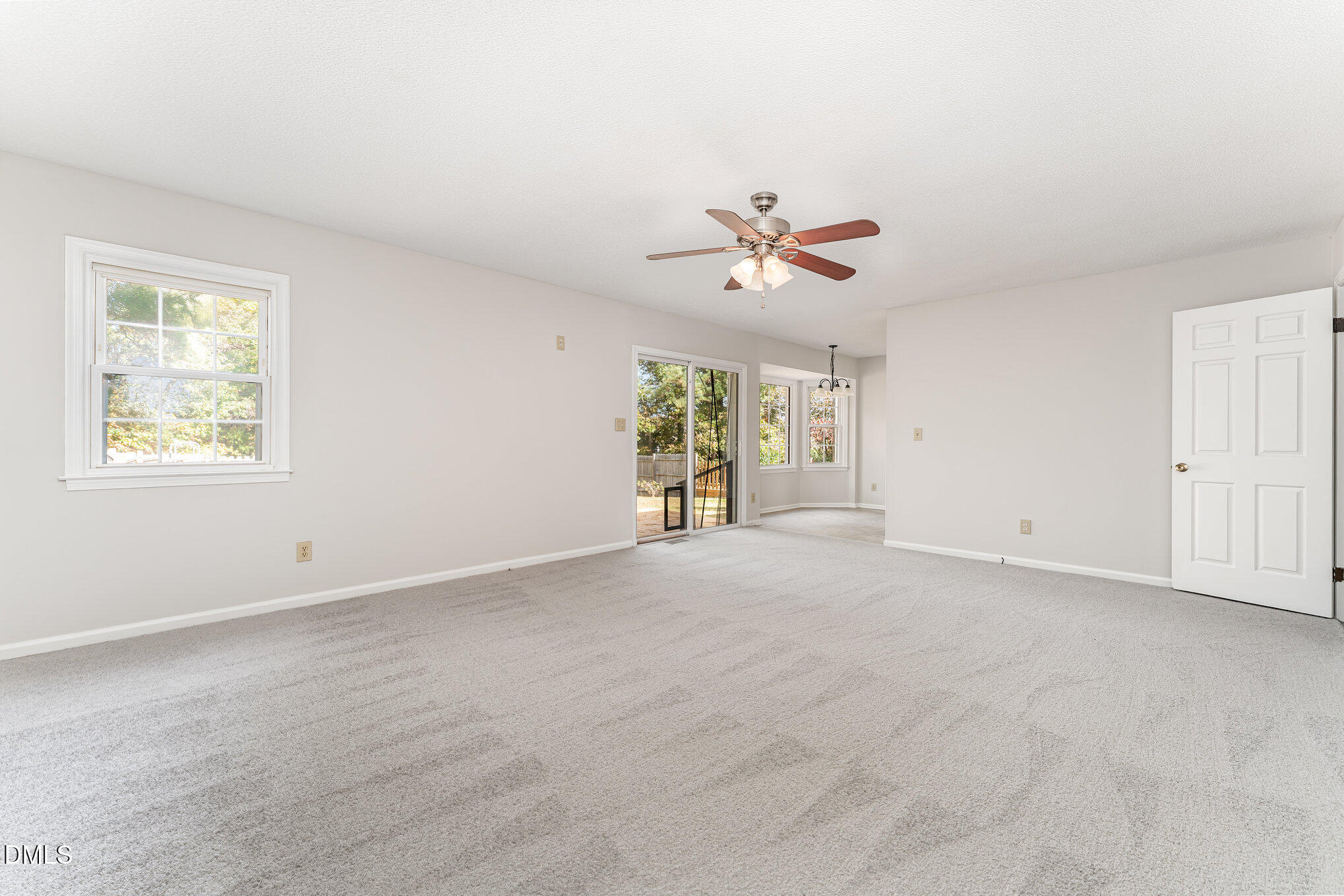 110 Rose Circle Dunn, NC 28334 - Photo 6 of 37 a view of an empty room with a window