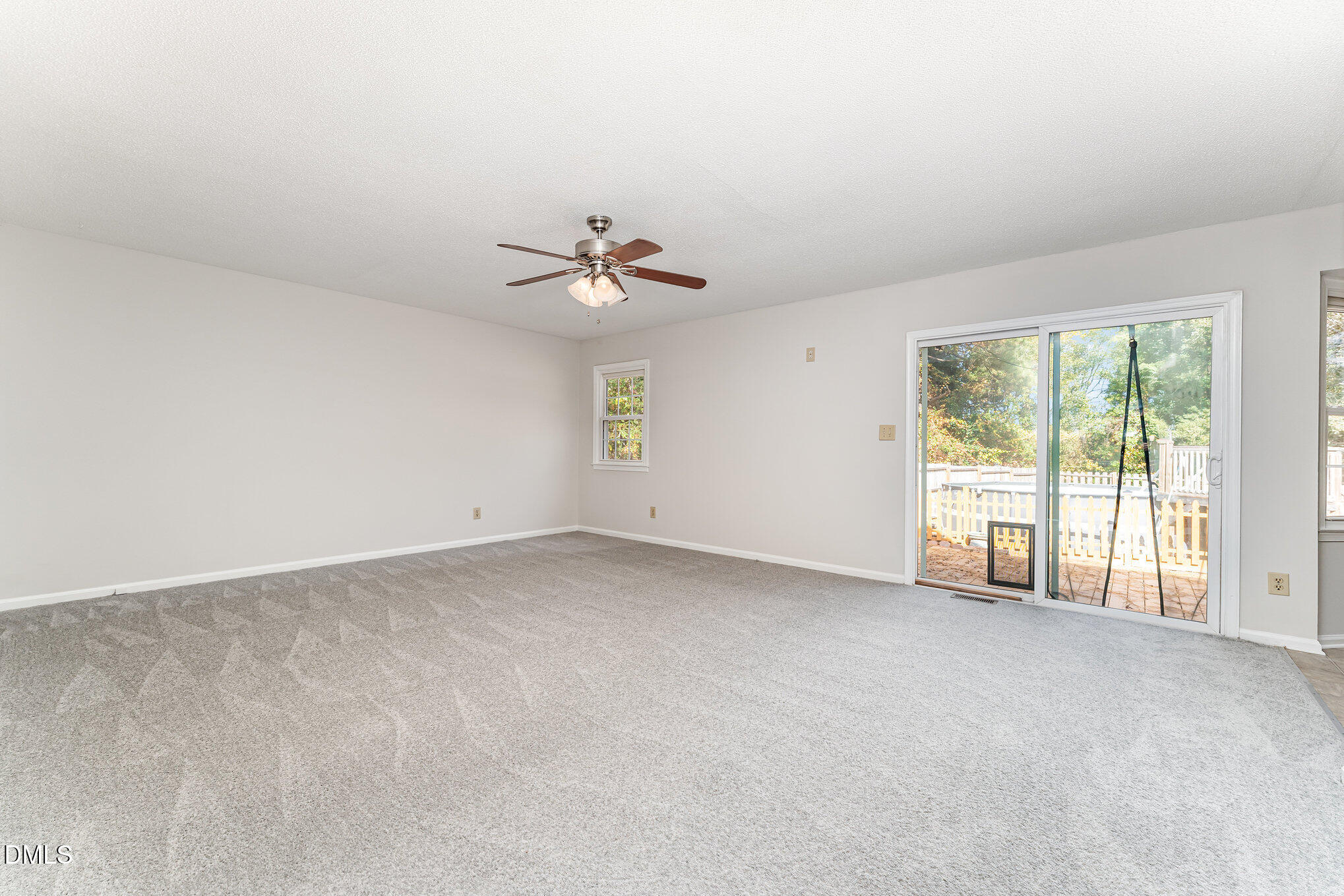 110 Rose Circle Dunn, NC 28334 - Photo 7 of 37 a view of an empty room with a window