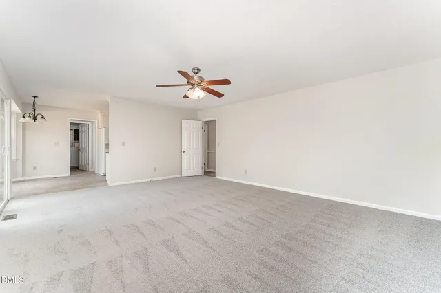 an empty room with a bathroom