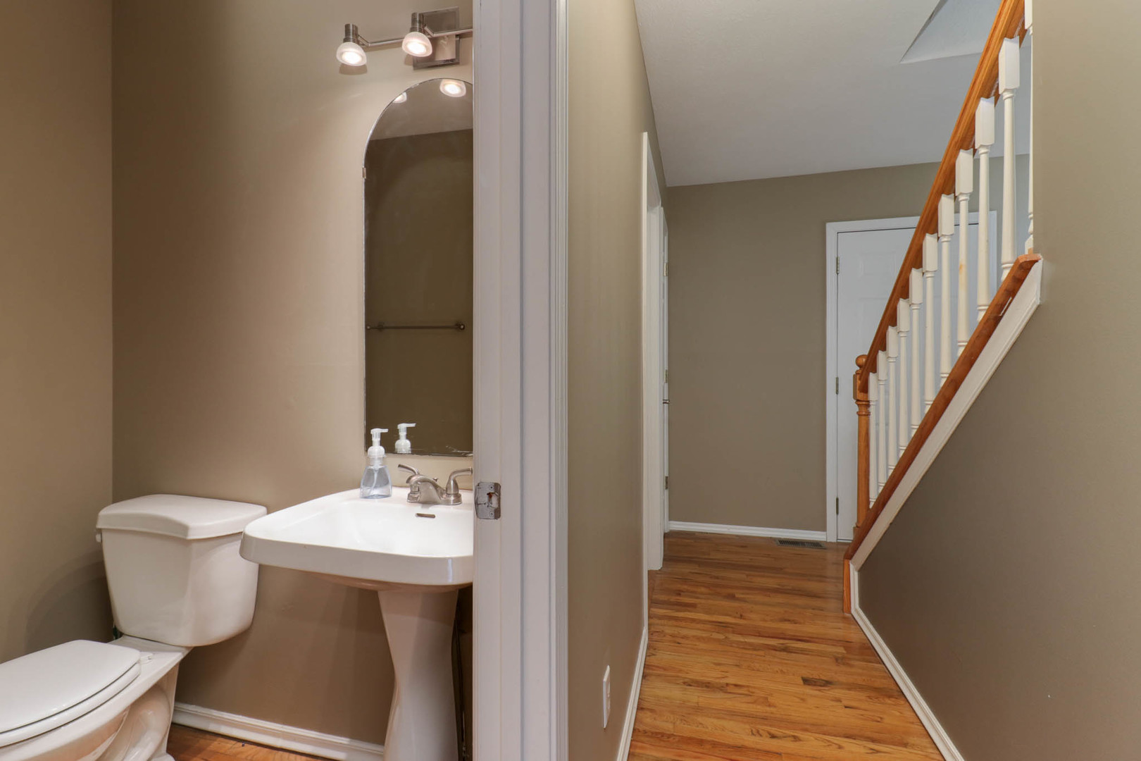 230 Parktrail Road Normal, IL 61761 - Photo 11 of 37 a bathroom with a sink and a mirror