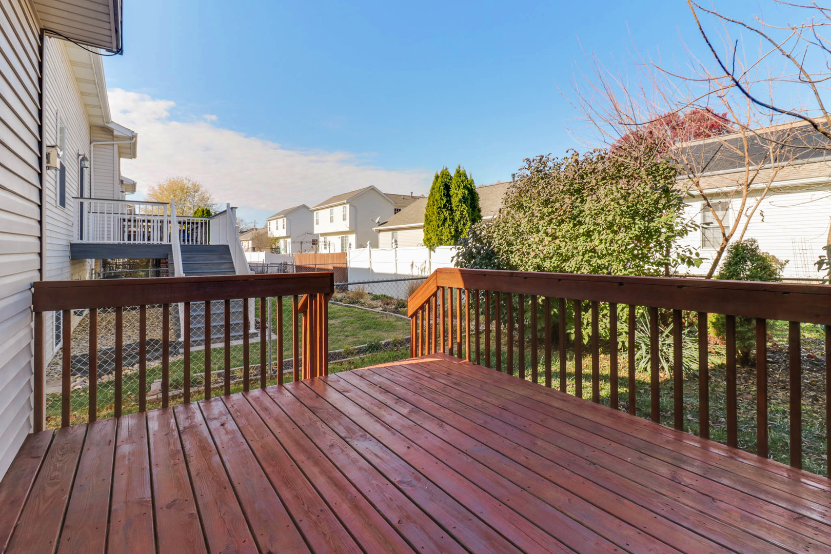 230 Parktrail Road Normal, IL 61761 - Photo 31 of 37 a view of a balcony with wooden floor