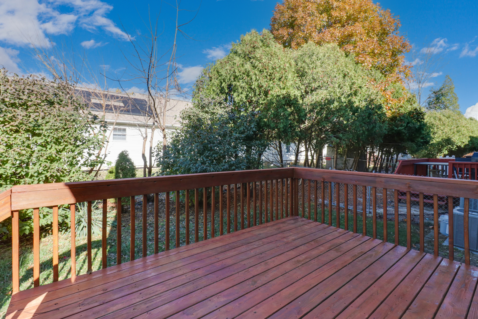 230 Parktrail Road Normal, IL 61761 - Photo 33 of 37 a balcony with wooden floor