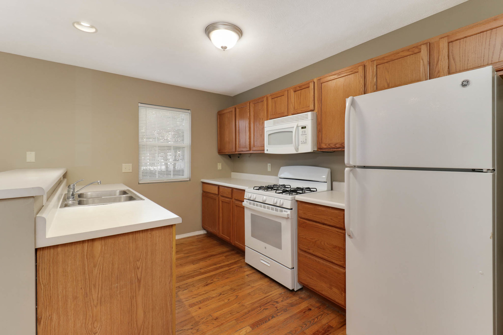 230 Parktrail Road Normal, IL 61761 - Photo 8 of 37 a kitchen with stainless steel appliances granite countertop a refrigerator stove a sink dishwasher and a refrigerator