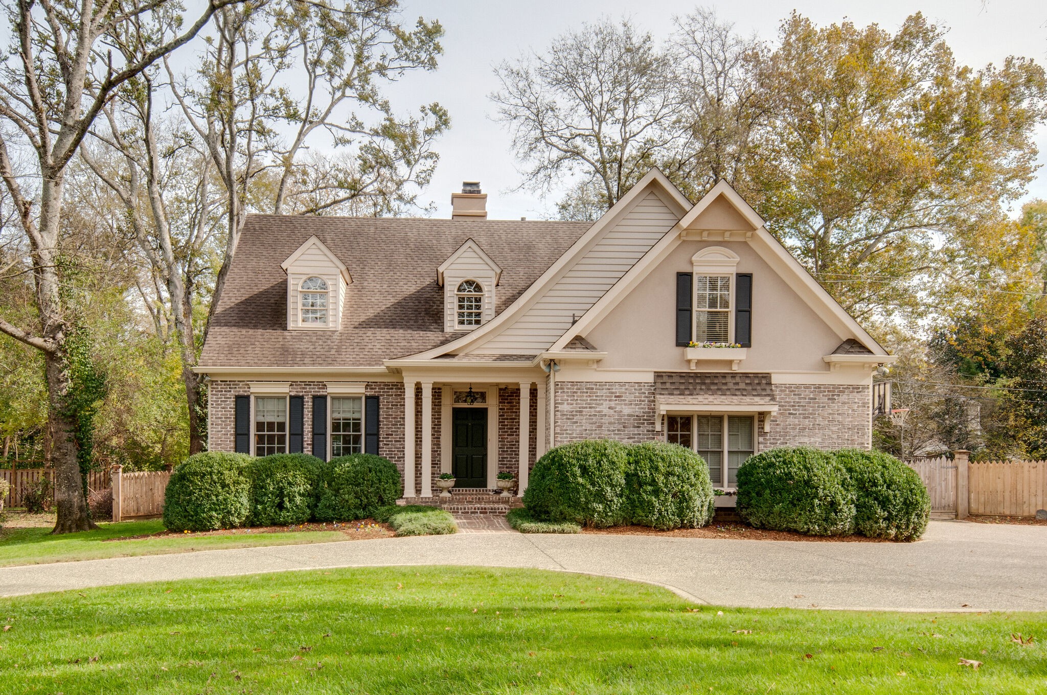 302 Page Road Nashville, TN 37205 - Photo 1 of 42 a front view of a house with a yard