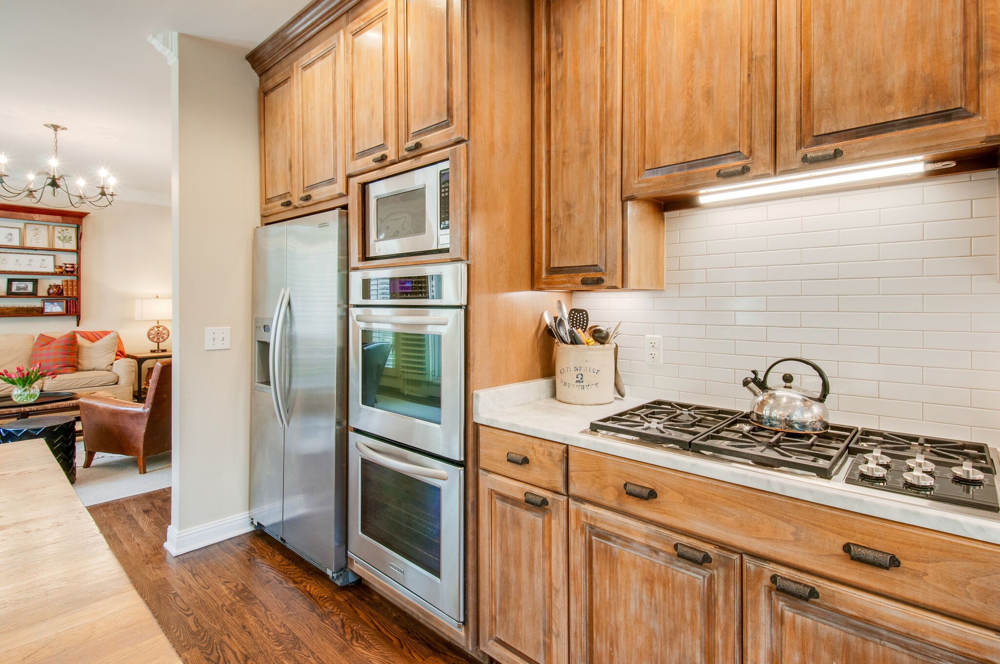 302 Page Road Nashville, TN 37205 - Photo 16 of 42 a kitchen with stainless steel appliances granite countertop a stove a sink and a refrigerator