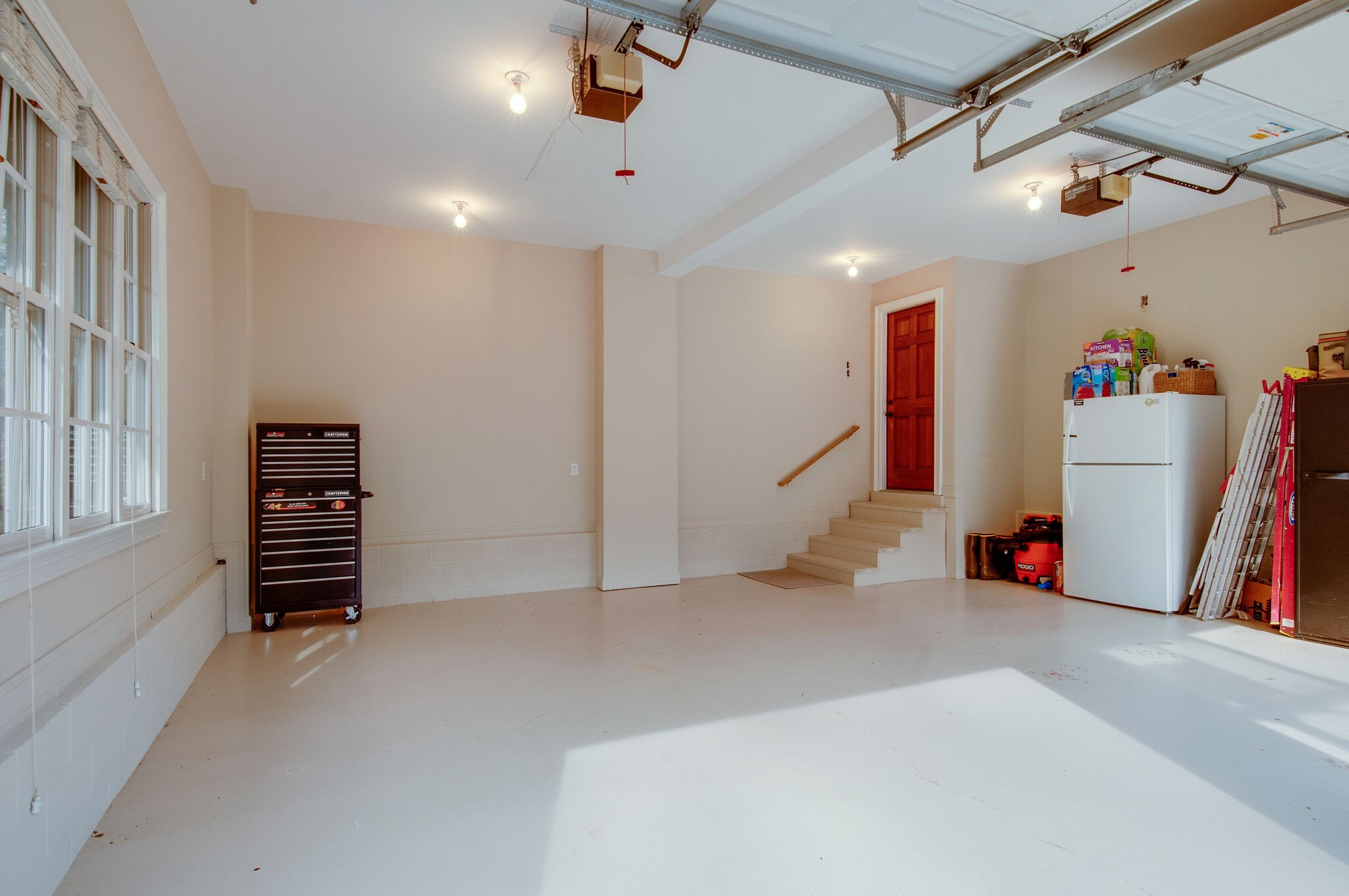 302 Page Road Nashville, TN 37205 - Photo 38 of 42 a view of an empty room with stairs and a couch