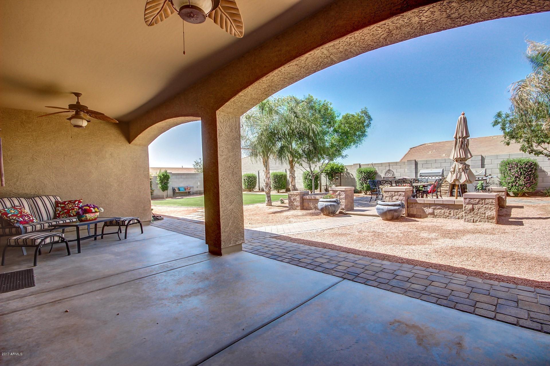21982 East Rosa Road Queen Creek, AZ 85142 - Photo 2 of 40 an outdoor space with patio
