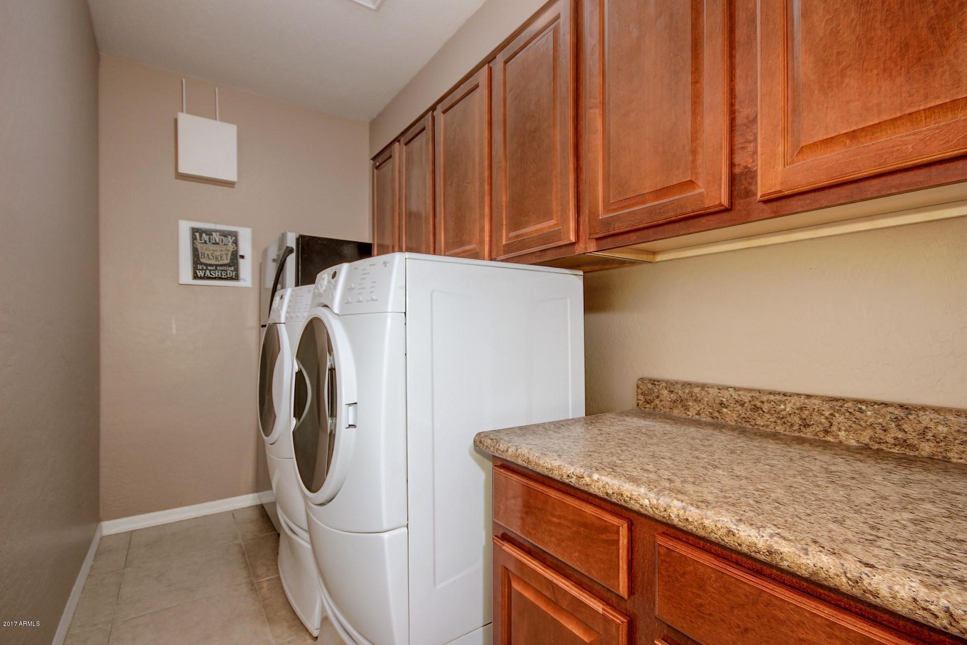 21982 East Rosa Road Queen Creek, AZ 85142 - Photo 25 of 40 a utility room with dryer and washer