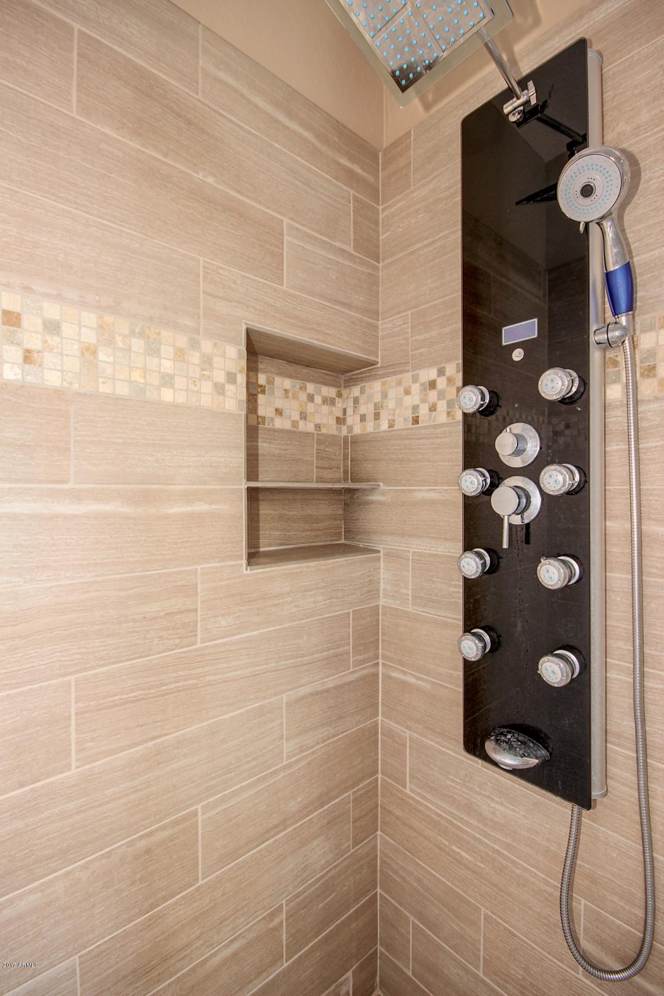 21982 East Rosa Road Queen Creek, AZ 85142 - Photo 33 of 40 a bathroom with a shower