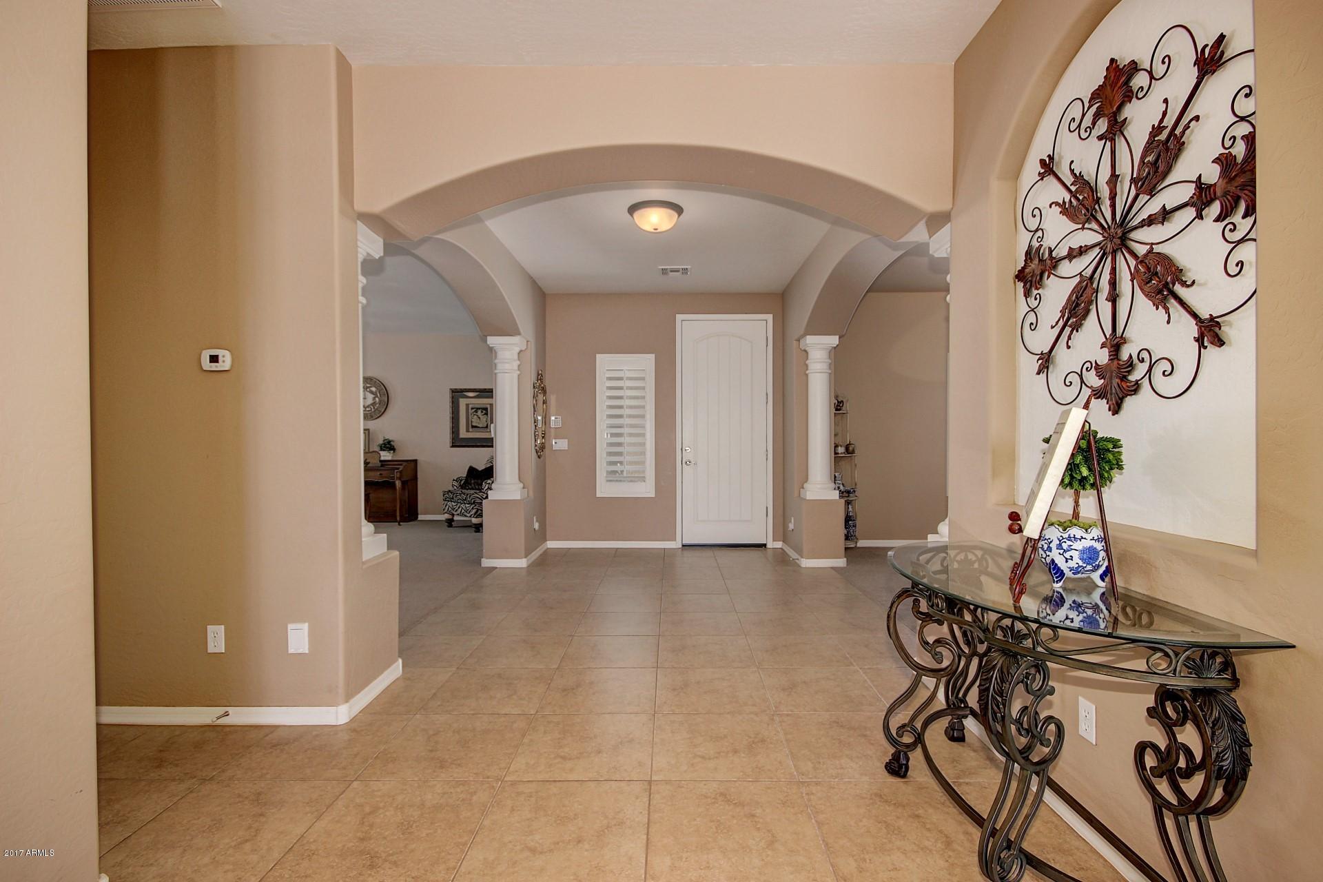 21982 East Rosa Road Queen Creek, AZ 85142 - Photo 8 of 40 a view of livingroom with furniture and wooden floor