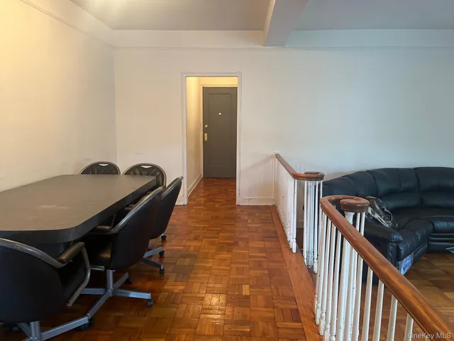 a view of a hallway with workspace