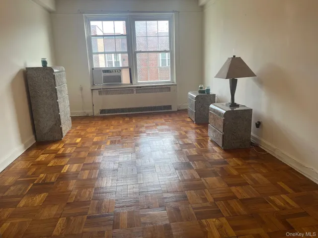 a room with a couch and a window