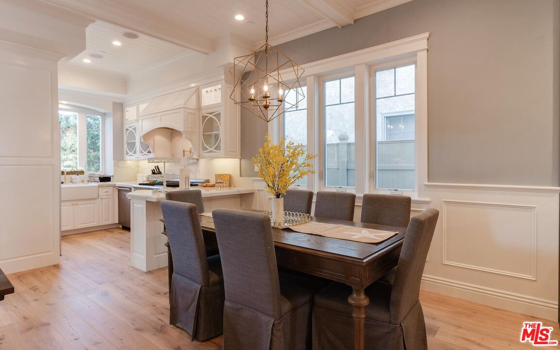 109 Geneva Walk Long Beach, CA 90803 - Photo 11 of 53 a view of a dining room with furniture window and wooden floor