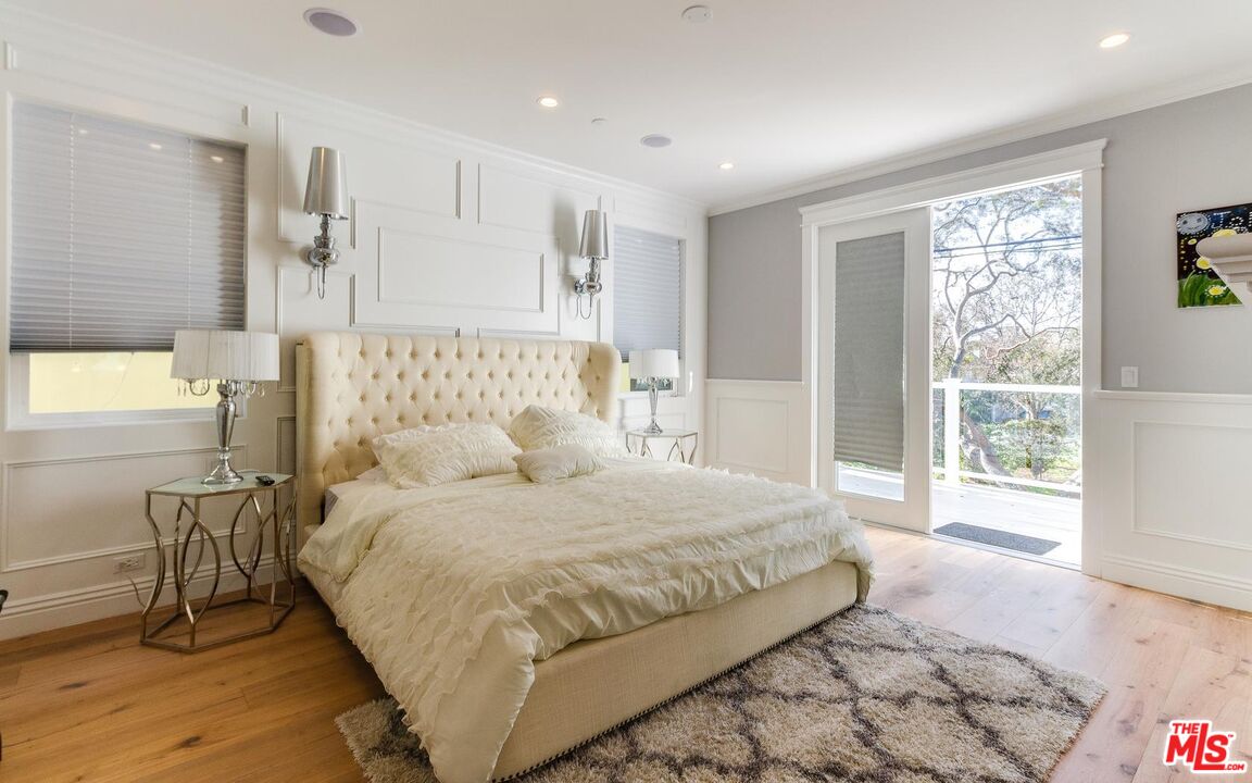 109 Geneva Walk Long Beach, CA 90803 - Photo 26 of 53 a bedroom with a large bed and a window