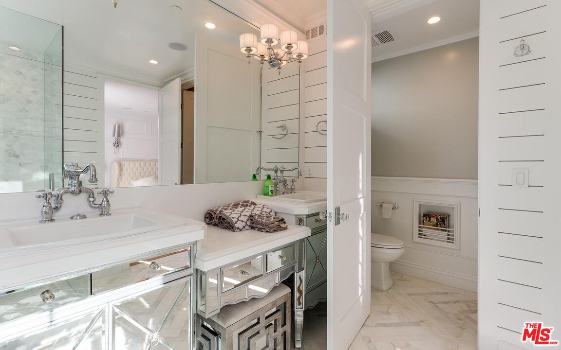 109 Geneva Walk Long Beach, CA 90803 - Photo 31 of 53 a bathroom with a sink vanity granite and a mirror