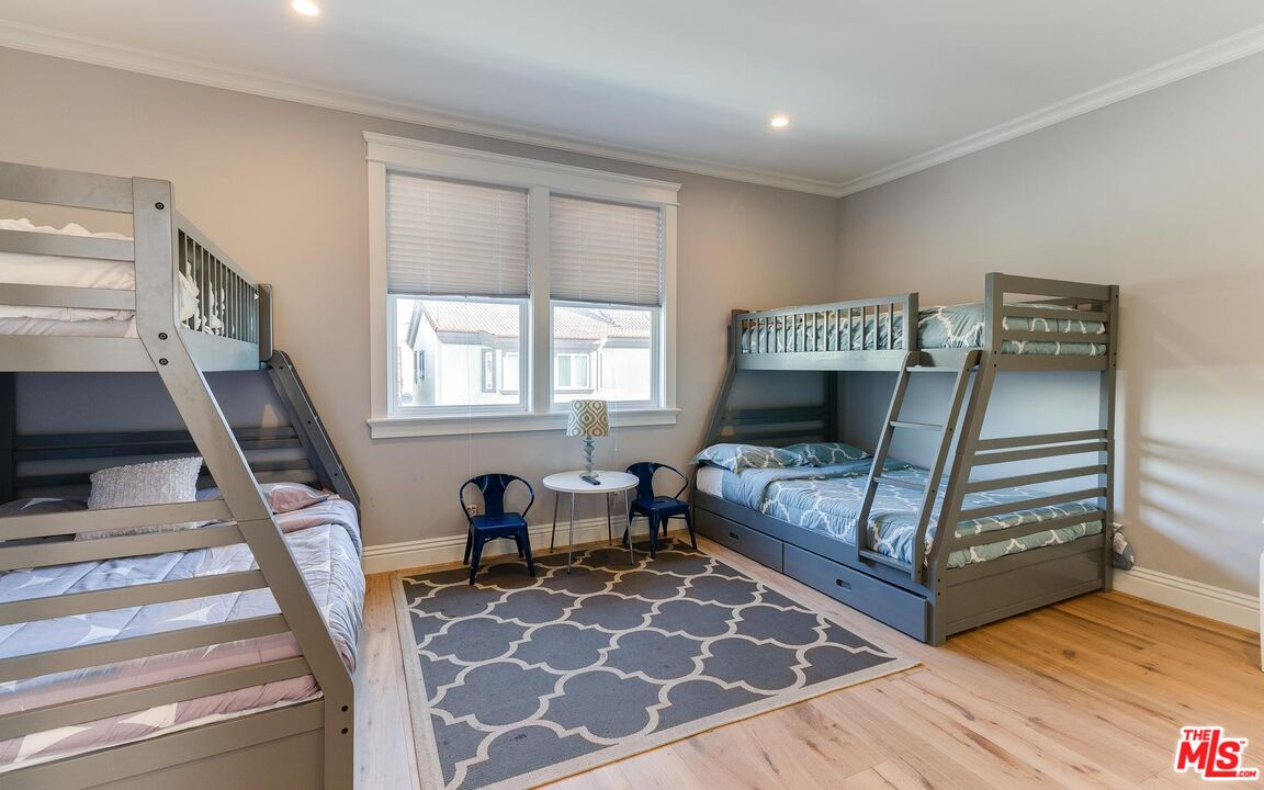 109 Geneva Walk Long Beach, CA 90803 - Photo 39 of 53 a bedroom with furniture and a window