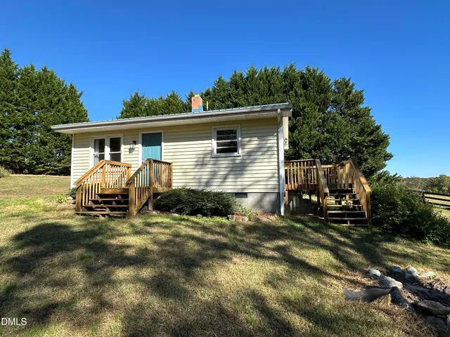a view of house with a outdoor space