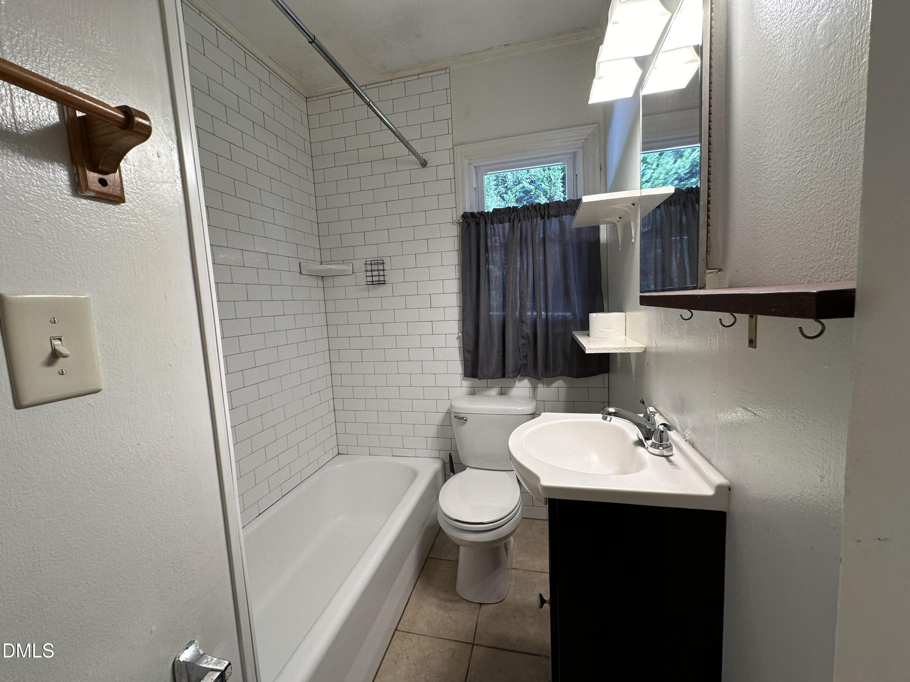 0 Kerley Road Durham, NC 27705 - Photo 6 of 10 a bathroom with a sink toilet and shower