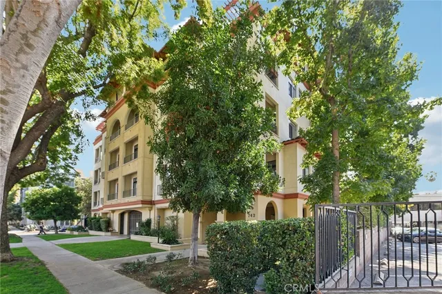 a front view of a multi story residential apartment buildings