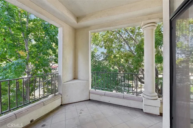 a room with a large window and outer view