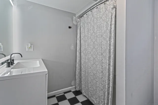 a view of a chairs on wooden deck