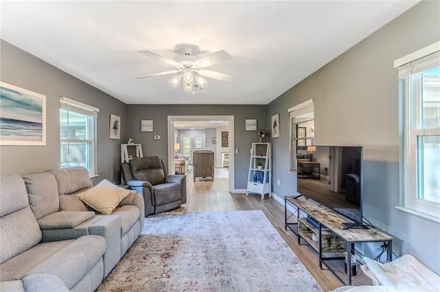 a front view of a house with a yard and porch