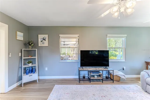 a front view of a house with a yard and porch