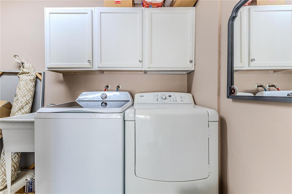 6428 Plantation Road Spring Hill, FL 34606 - Photo 37 of 50 a utility room with dryer and washer