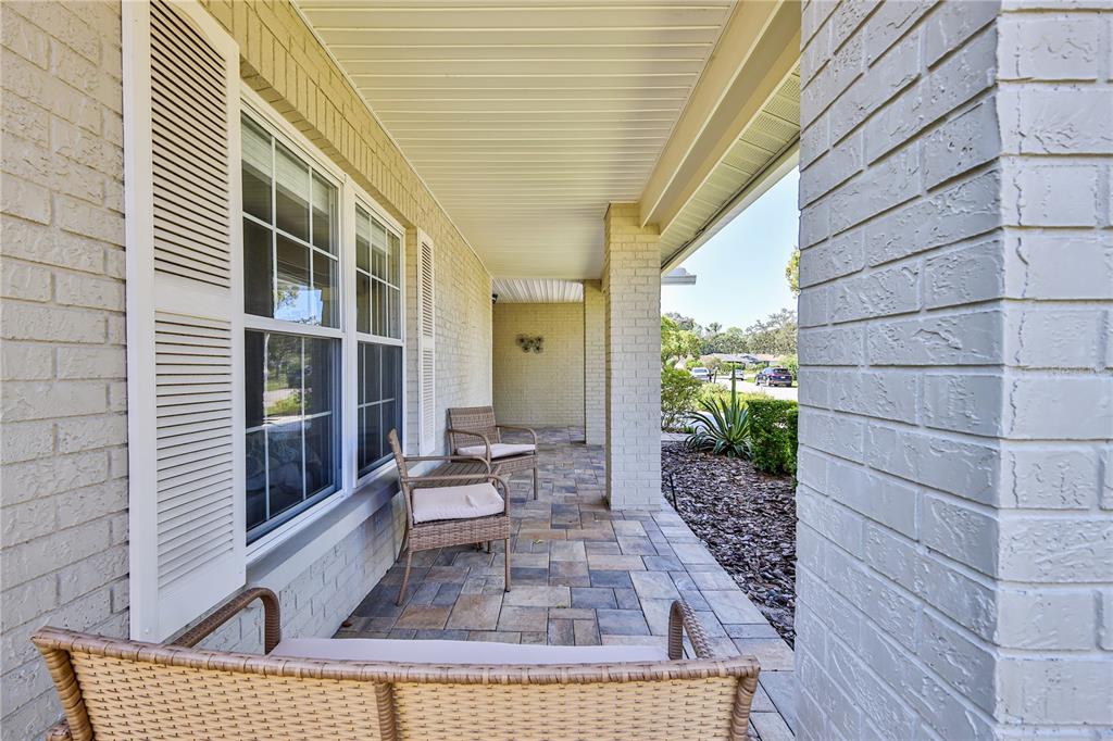 6428 Plantation Road Spring Hill, FL 34606 - Photo 6 of 50 a view of a porch with furniture