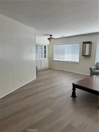 a view of a livingroom with a workspace