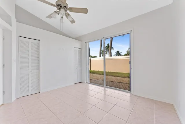 a view of room with window and cabinet