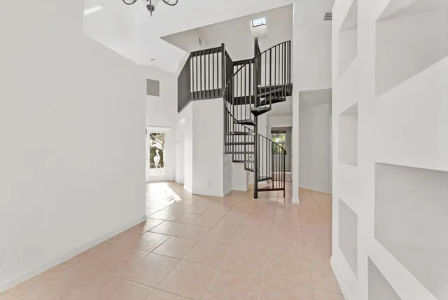 a view of an entryway with a white walls
