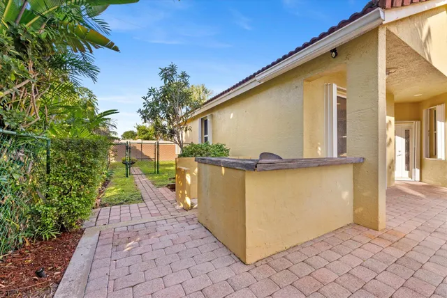 a view of a back yard of the house