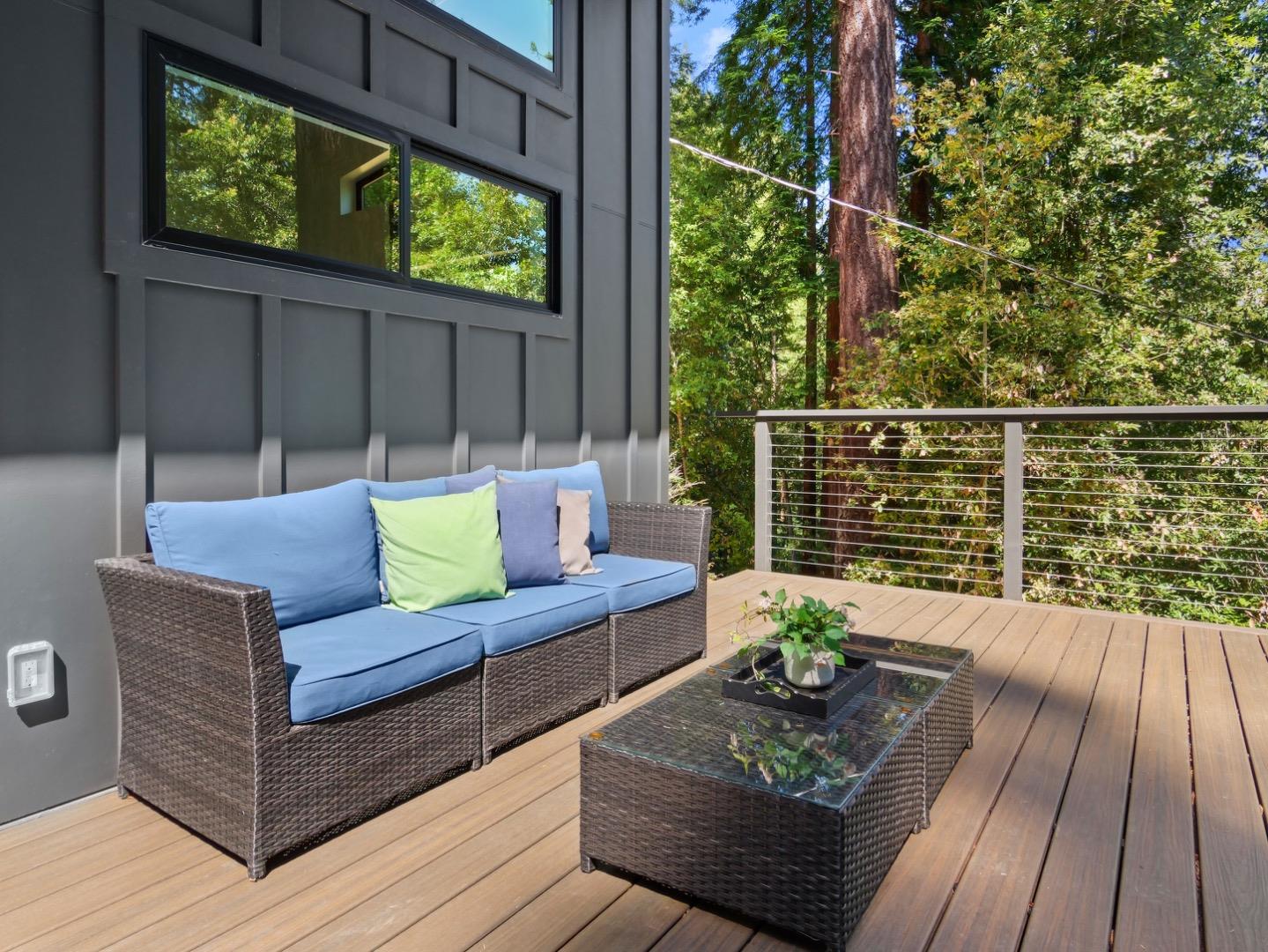 1495 McLellan Road Felton, CA 95018 - Photo 12 of 20 a view of a wooden deck with furniture