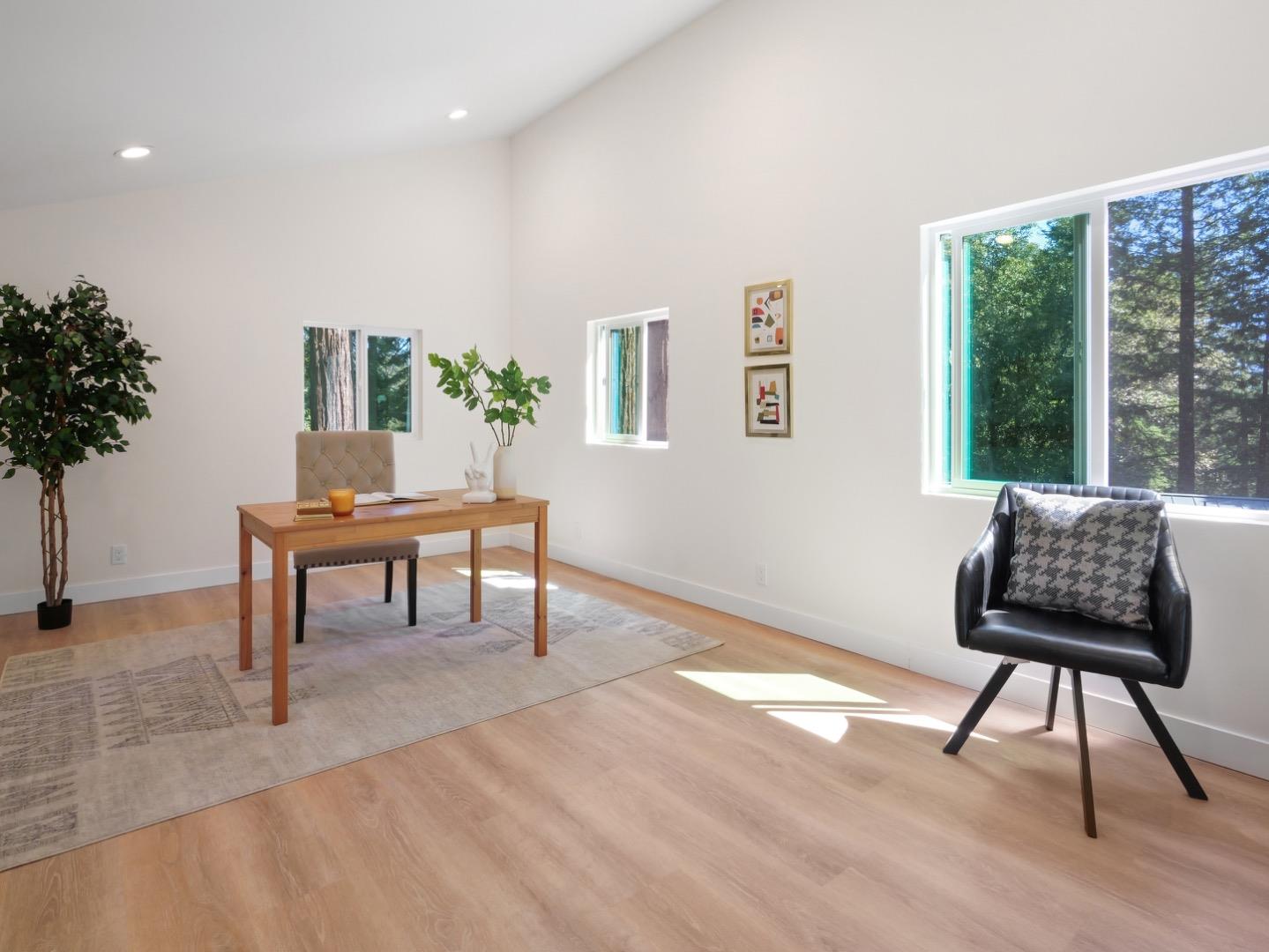 1495 McLellan Road Felton, CA 95018 - Photo 16 of 20 a living room with furniture and a potted plant