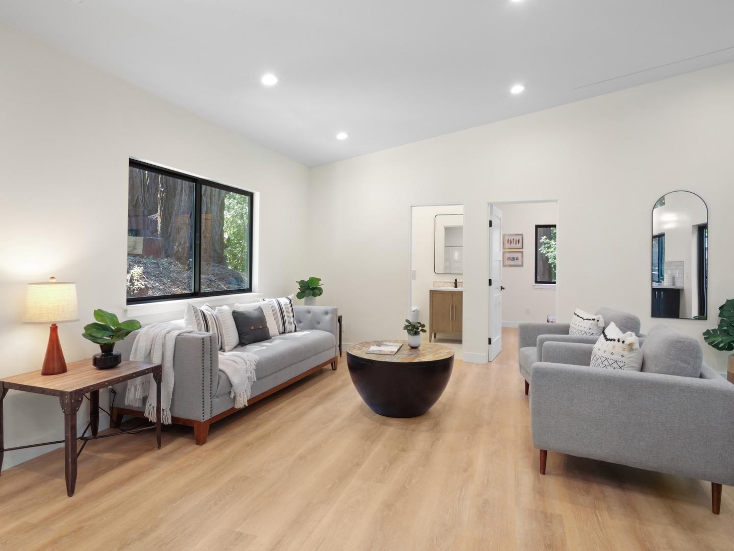 1495 McLellan Road Felton, CA 95018 - Photo 4 of 20 a living room with furniture and a large window