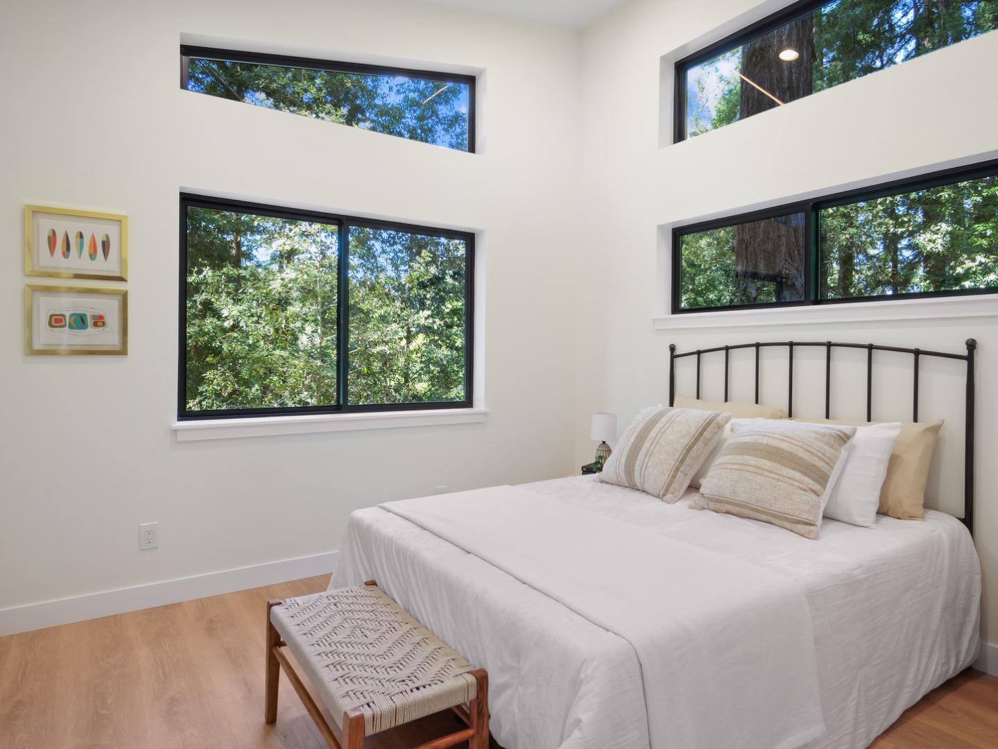 1495 McLellan Road Felton, CA 95018 - Photo 6 of 20 a bedroom with a bed and a window