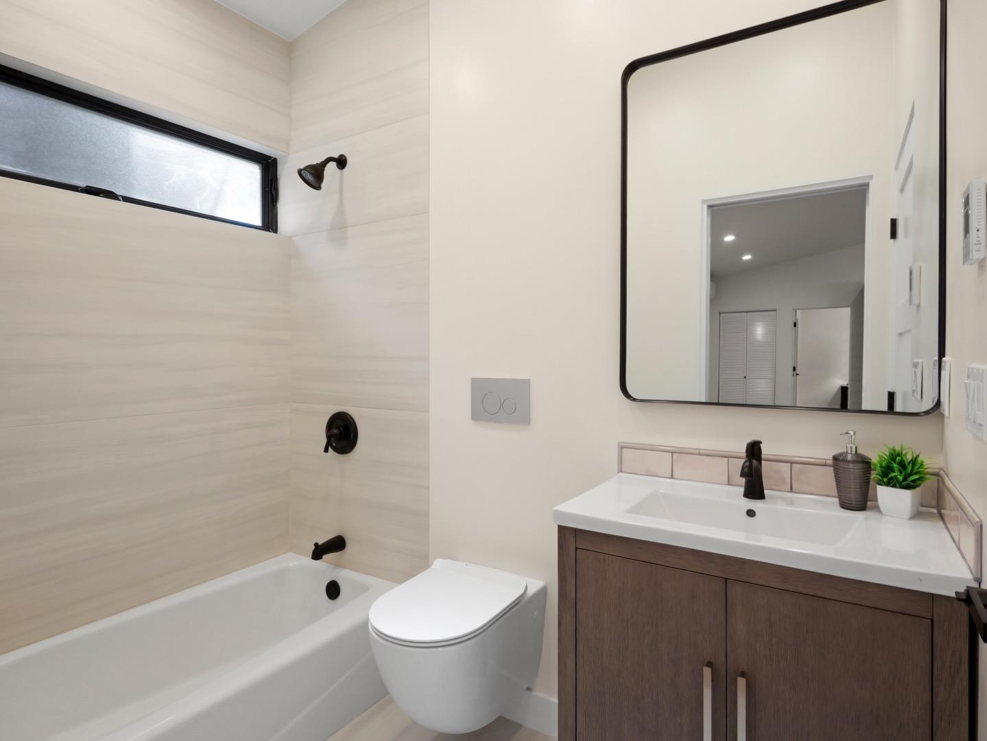 1495 McLellan Road Felton, CA 95018 - Photo 7 of 20 a bathroom with a bathtub shower sink and mirror