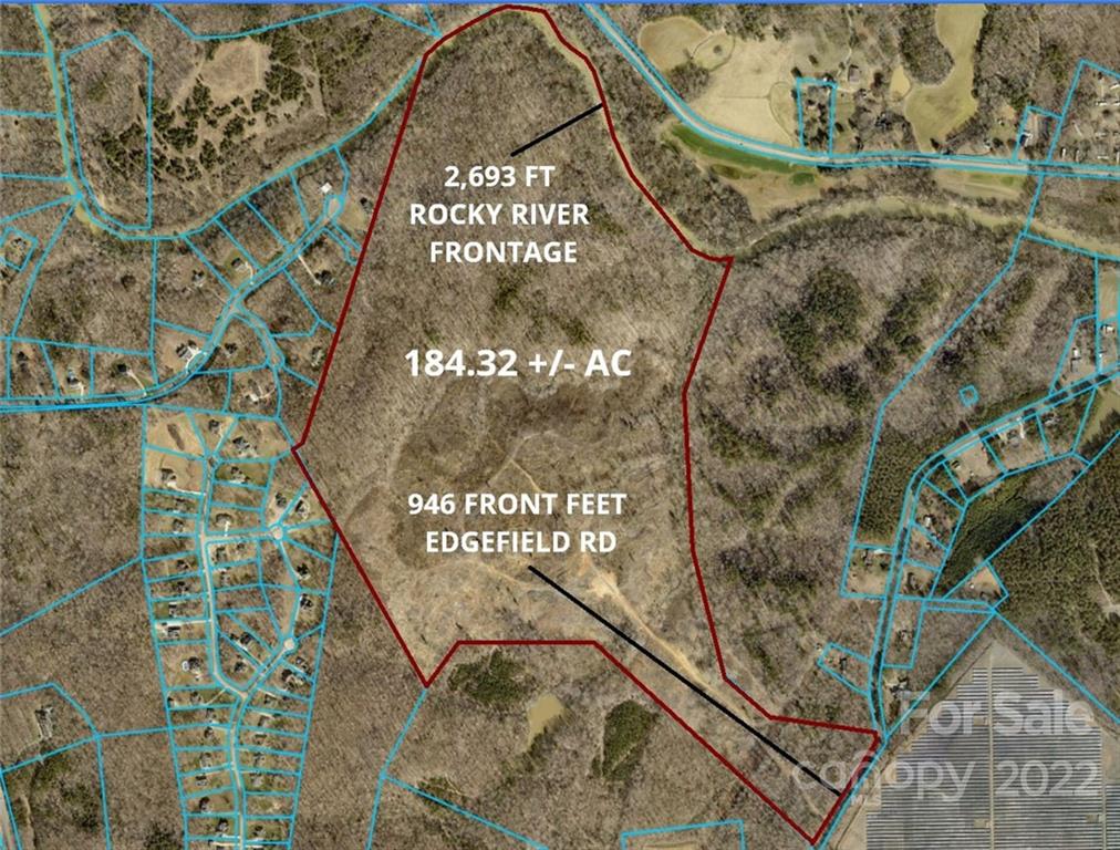 7700 Edgefield Road Concord, NC 28025 - Photo 2 of 48 a sign that is sitting on a wooden floor