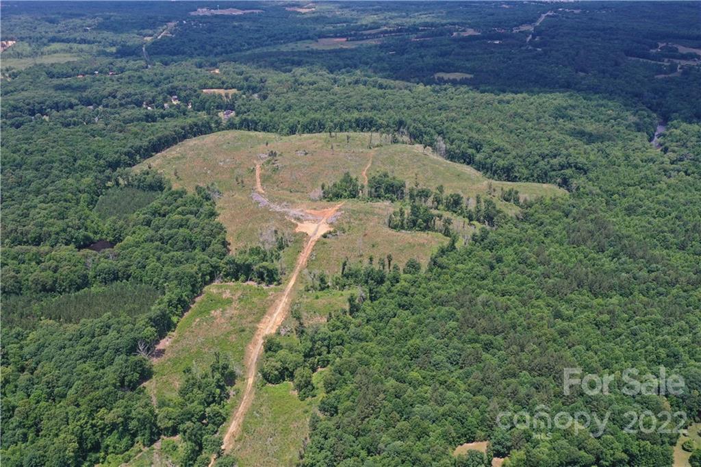 7700 Edgefield Road Concord, NC 28025 - Photo 9 of 48 an aerial view of a house with a yard
