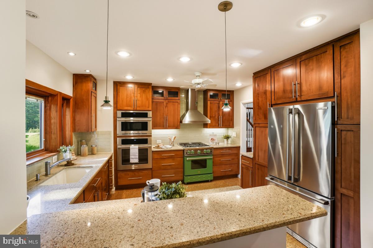418 Neale Court Silver Spring, MD 20901 - Photo 8 of 33 Quartz countertops and pendant lighting!